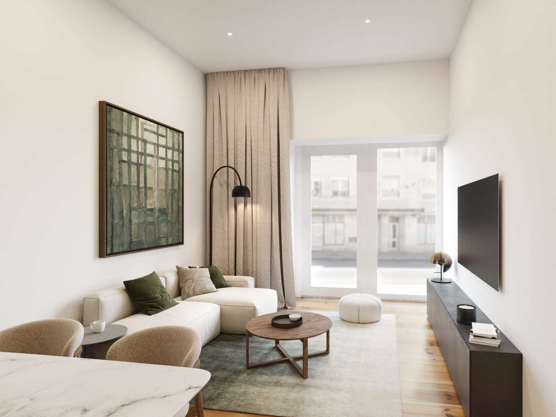 Sala de estar com mesa de refeições junto à janela